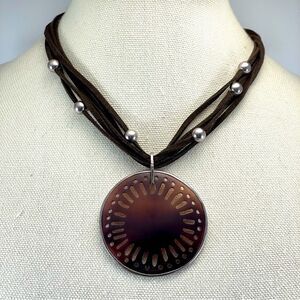 Retired Silpada brown suede silver beaded necklace with carved pen shell pendant